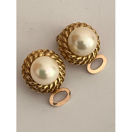 651 - 9 carat GOLD and PEARL CLIP-ON EARRINGS. Having a single PEARL set to centre of a GOLD double rope t... 