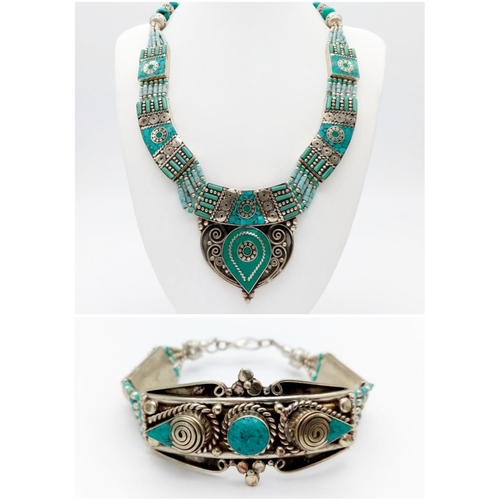 146 - A native American (Navaho or Zuni?) white metal and turquoise necklace and bracelet set in a present... 