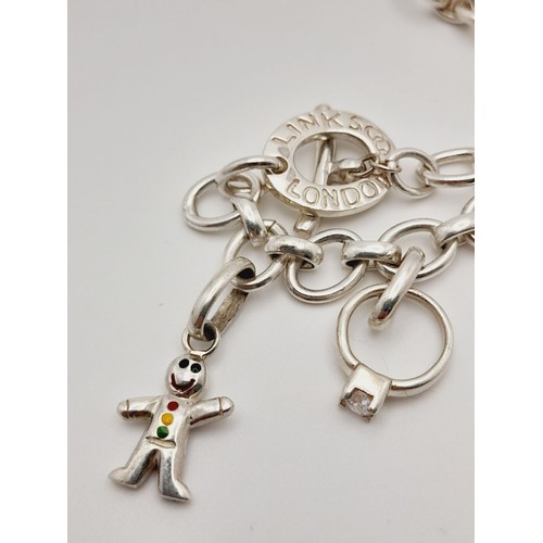 467 - A STERLING SILVER CHARM NECKLACE WITH 2 CHARMS & T BAR CLASP 35.2G, 44CM LENGTH.

ref: 8674