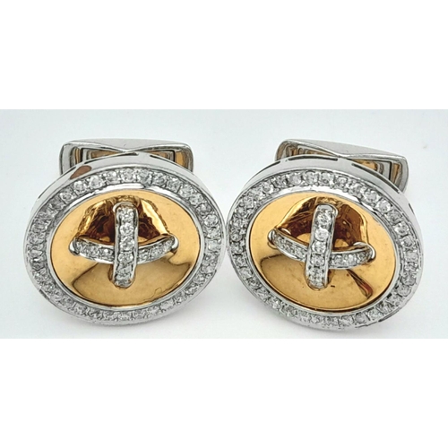 113 - A Pair of 14K White and Yellow Gold Diamond Cufflinks. Circular form with 1ct (2ctw) of decorative d... 