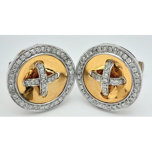 113 - A Pair of 14K White and Yellow Gold Diamond Cufflinks. Circular form with 1ct (2ctw) of decorative d... 