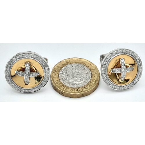 113 - A Pair of 14K White and Yellow Gold Diamond Cufflinks. Circular form with 1ct (2ctw) of decorative d... 