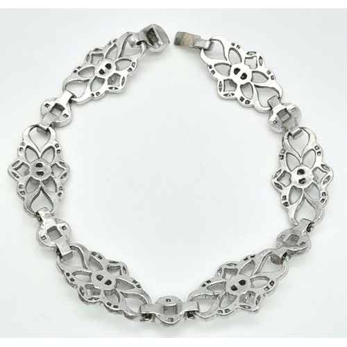 127 - An Art Deco Platinum and Diamond Bracelet. Old cut diamonds - 3ctw. 17.3g total weight. 18cm length.