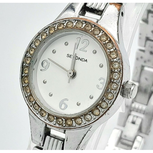 1365 - A Ladies Stone Set Quartz Sekonda Watch. Stainless steel bracelet and case - 24mm. White dial. In wo... 