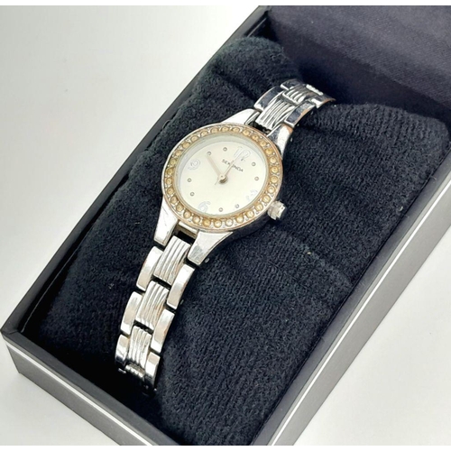 1365 - A Ladies Stone Set Quartz Sekonda Watch. Stainless steel bracelet and case - 24mm. White dial. In wo... 