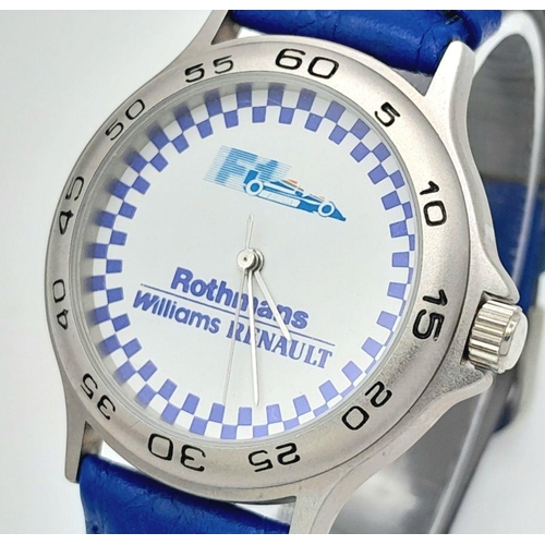 1372 - A Rothmans Williams Renault F1 Quartz Watch. Blue leather strap. Case - 36mm. In working order.