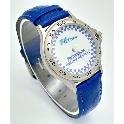 1372 - A Rothmans Williams Renault F1 Quartz Watch. Blue leather strap. Case - 36mm. In working order.