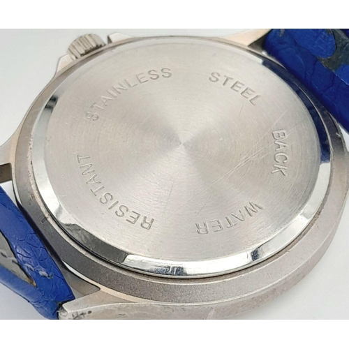 1372 - A Rothmans Williams Renault F1 Quartz Watch. Blue leather strap. Case - 36mm. In working order.