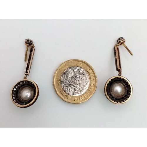 141 - A Pair of Exquisite Art Deco 18K Gold South Sea Pearl, Diamond and Black Onyx Drop Earrings. 1ctw ap... 