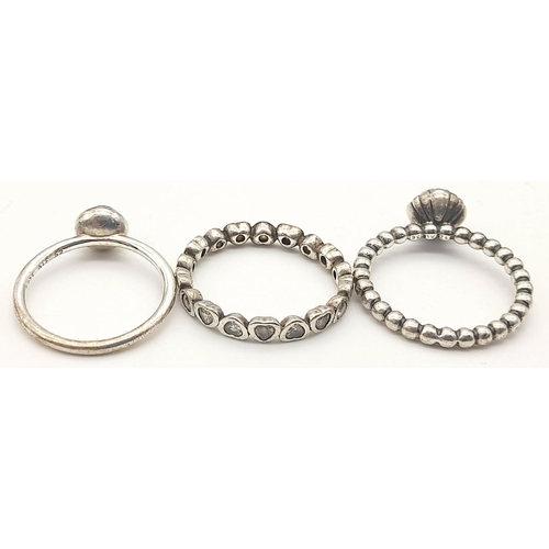 1416 - Three Pandora 925 Silver Rings - various styles. Please see photos for details. Sizes L, N and O/P.