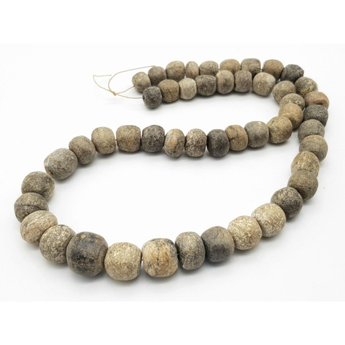143 - An Ancient Necklace made of Wolly Mammoth Bone Beads! Devensian stage - 120000 - 10000 years ago. 60... 