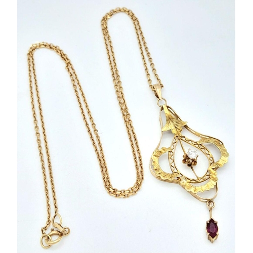 197 - An Edwardian 9K Yellow Gold Diamond and Ruby Pendant on a 9K Yellow Gold Necklace. Pendant - 4.5cm. ... 