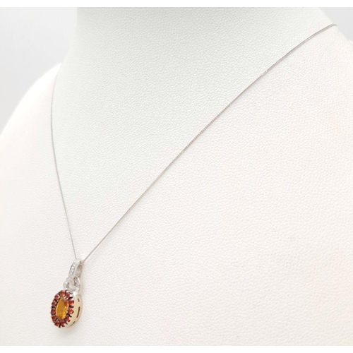 232 - An 18K White Gold, Citrine, Garnet and Diamond Pendant on a Disappearing 9K White Gold Necklace. 2cm... 