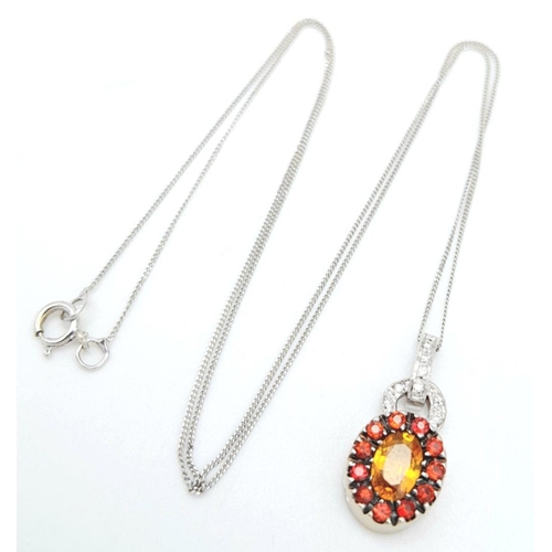 232 - An 18K White Gold, Citrine, Garnet and Diamond Pendant on a Disappearing 9K White Gold Necklace. 2cm... 