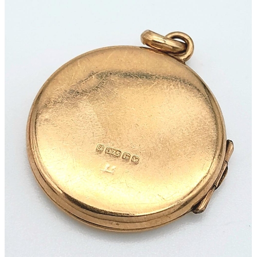 240 - A Vintage 9K Yellow Gold Locket Pendant. 2cm diameter. 2.35g weight.