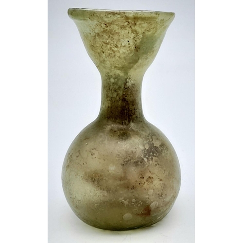 282 - An Ancient Pale Green Glass Vessel. 4-5th Century AD. Yellow-green translucent glass, globular body ... 