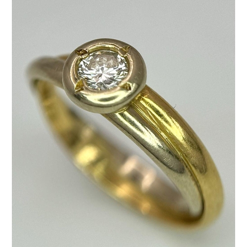 316 - An 18K Yellow and White Gold Diamond Solitaire Ring. 0.30ct. 3.15g total weight.