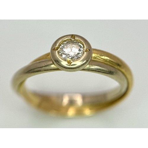 316 - An 18K Yellow and White Gold Diamond Solitaire Ring. 0.30ct. 3.15g total weight.