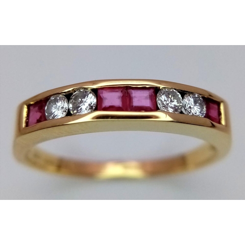 351 - An 18K Yellow Gold, Diamond and Ruby Ring. Four square cut rubies with four bright round cut diamond... 