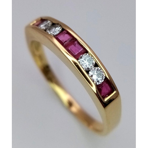 351 - An 18K Yellow Gold, Diamond and Ruby Ring. Four square cut rubies with four bright round cut diamond... 