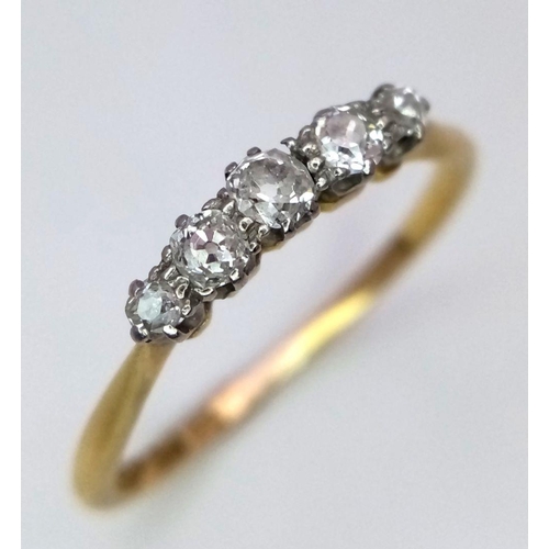 365 - An 18K Yellow Gold Five Stone Diamond Ring. Graduated brilliant round cut diamonds - 0.4ctw. Size P.... 