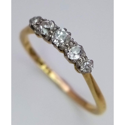 365 - An 18K Yellow Gold Five Stone Diamond Ring. Graduated brilliant round cut diamonds - 0.4ctw. Size P.... 