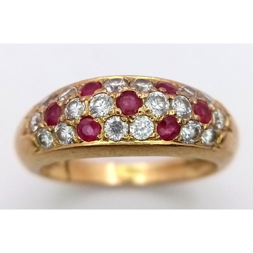 372 - A 9K Yellow Gold Ruby and Diamond Three Row Cluster Ring. Size M. 3.57g total weight.