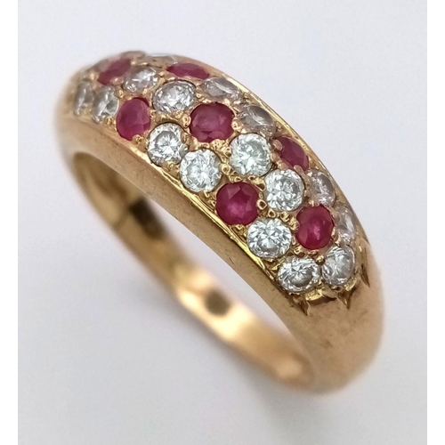 372 - A 9K Yellow Gold Ruby and Diamond Three Row Cluster Ring. Size M. 3.57g total weight.