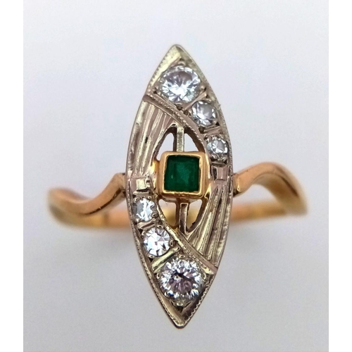 379 - A Beautiful 18K Yellow Gold, Diamond and Emerald Marquise Shaped Ring. Central emerald with graduati... 