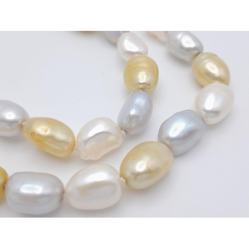 428 - A Small Baroque Shaped Gold, Silver and White Pearl Necklace. 925 clasp. 44cm.