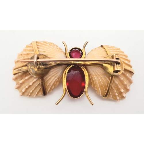 435 - An Antique Gold, Shell and Garnet Insect Brooch. A wonderful unique piece. 4.5cm.