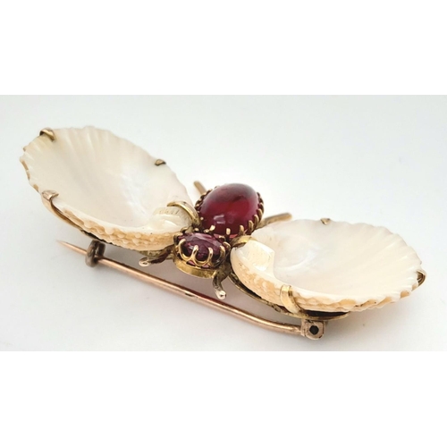 435 - An Antique Gold, Shell and Garnet Insect Brooch. A wonderful unique piece. 4.5cm.