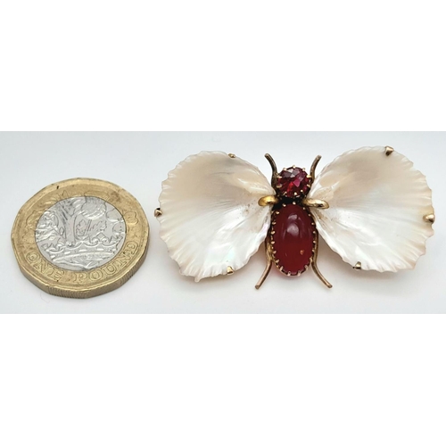 435 - An Antique Gold, Shell and Garnet Insect Brooch. A wonderful unique piece. 4.5cm.