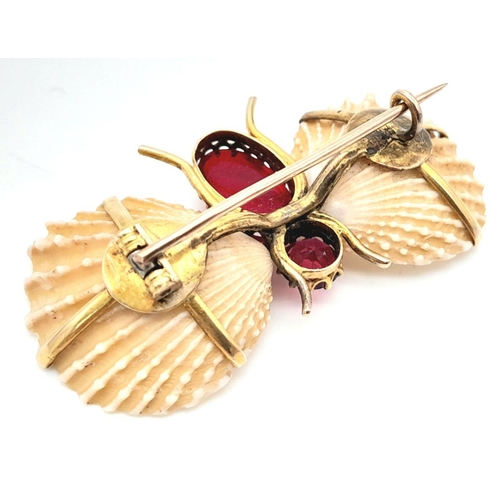 435 - An Antique Gold, Shell and Garnet Insect Brooch. A wonderful unique piece. 4.5cm.