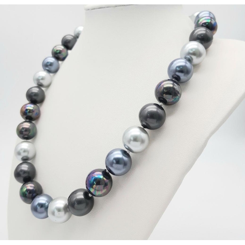 470 - A South Sea Pearl Shell Shades of Silver and Grey Beaded Necklace. 14mm beads. Necklace length - 44c... 