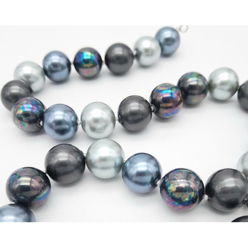 470 - A South Sea Pearl Shell Shades of Silver and Grey Beaded Necklace. 14mm beads. Necklace length - 44c... 