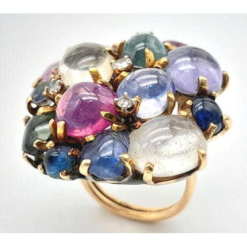 505 - An 18K Yellow Gold Rivo Multi Coloured Sapphire and Diamond Ring. Cabochons of wonder with diamond i... 