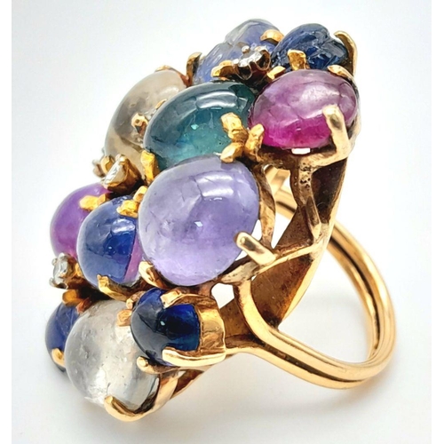 505 - An 18K Yellow Gold Rivo Multi Coloured Sapphire and Diamond Ring. Cabochons of wonder with diamond i... 