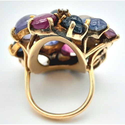 505 - An 18K Yellow Gold Rivo Multi Coloured Sapphire and Diamond Ring. Cabochons of wonder with diamond i... 