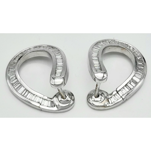 512 - A Stunning Pair of 18K White Gold and Diamond Twisted Horse Shoe Earrings. DM makers mark. 3ctw of b... 