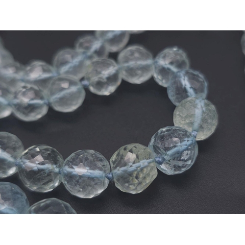 519 - A Wondrous Faceted Aquamarine Gemstone Necklace. Graduating beads of ice blue beauty. 297ctw. 50cm l... 