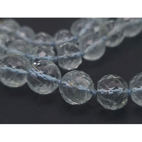 519 - A Wondrous Faceted Aquamarine Gemstone Necklace. Graduating beads of ice blue beauty. 297ctw. 50cm l... 