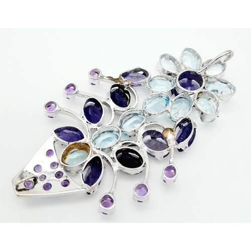 540 - A Blue Sapphire, Aquamarine and Amethyst Decorative  Floral Silver Pendant. Set in 925 Sterling silv... 