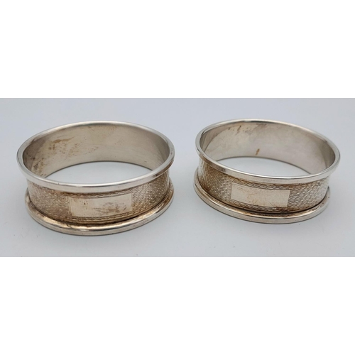 1356 - A Pair of Hallmarked 1966 Engine Turned Decoration Silver Napkin Rings. 19.72 Grams.