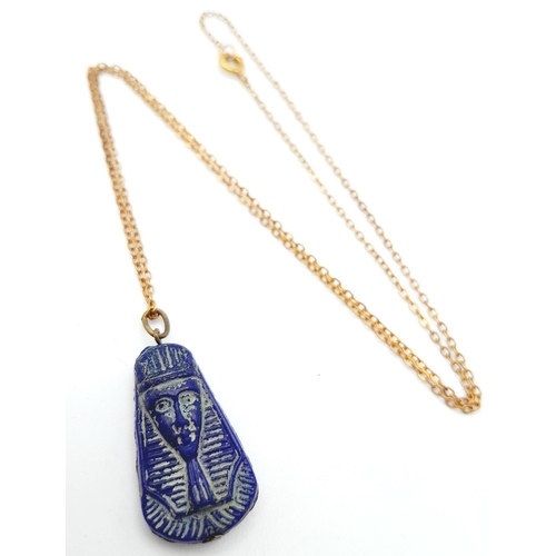 1370 - An Egyptian Pressed Blue Glass Pendant in the Shape of Tutankhamun on a 46cm Rolled Gold Chain. Pend... 