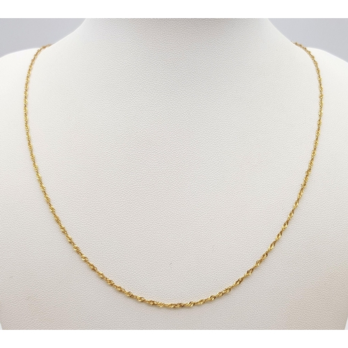 1401 - A 9K Yellow Gold Petit Twist Link Necklace. 44cm. 1.6g total weight.