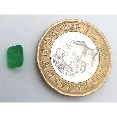 1364 - A 0.80ct Rectangle cut Columbian Emerald. 
6mm long.