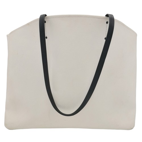 1397 - A Prada Canapa Racing Logo Tote Bag. White Canvas exterior with a printed Prada logo on the front, f... 