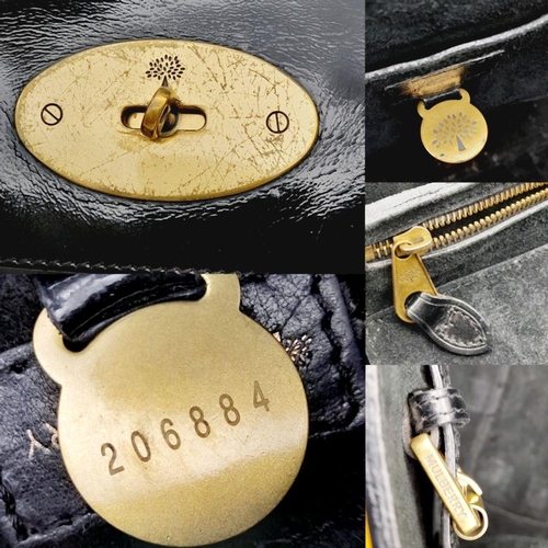 1361 - A Black Mulberry Bayswater Handbag. Gloss Leather exterior with gold-tone hardware, double rounded t... 