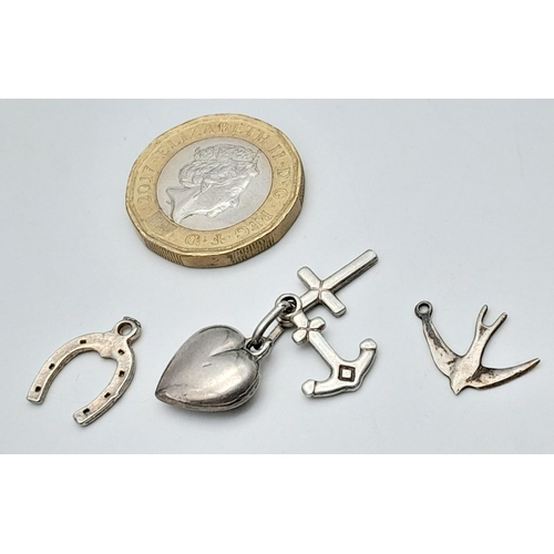 1374 - Three Silver Charms - lucky horseshoe, swallow, and faith, hope and love.